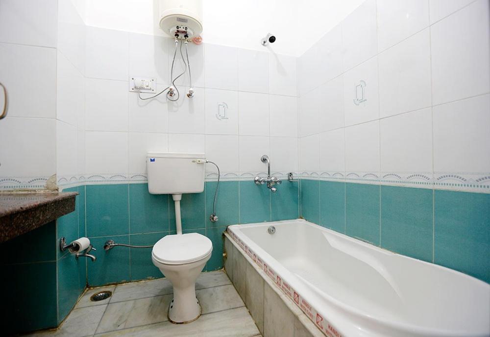 Hotel Goroomgo New Ambika Mall Road